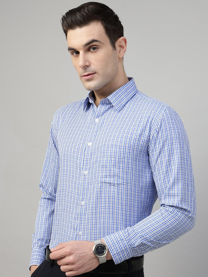 Pair this hancock blue windowpane checked spread collar cotton wrinkle ressistant formal shirt with navy blue trousers and waist belt with black formal shoes for sophisticated look.
