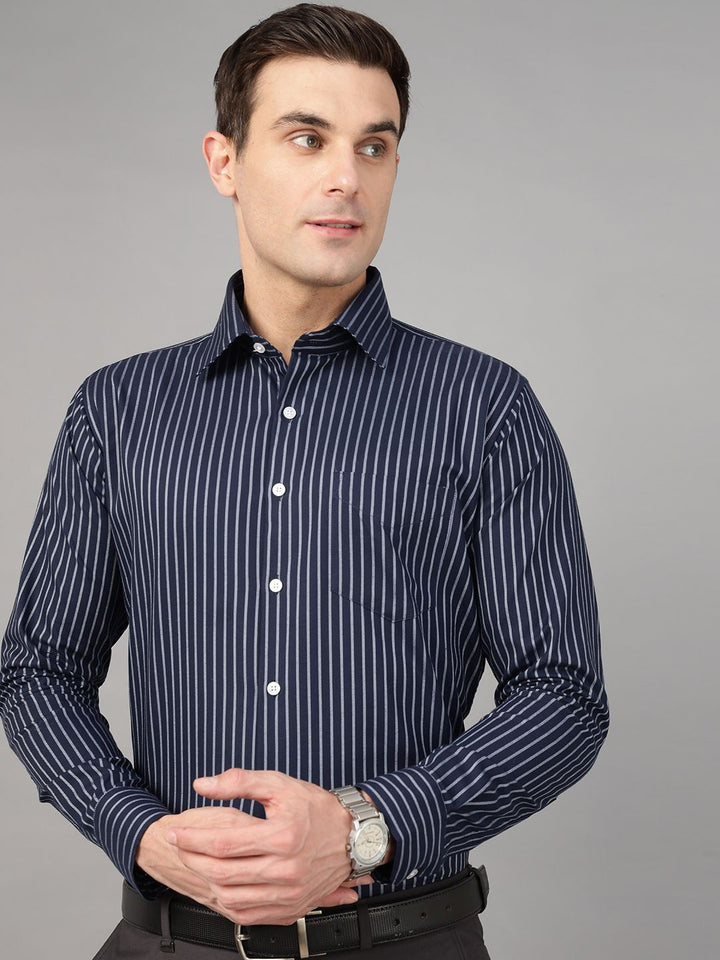 Navy Blue vertical striped pure cotton opaque Formal shirt ,has a spread collar, patch pocket, button placket, long regular sleeves, curved hem