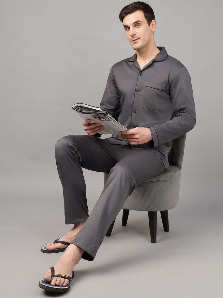 Dark Grey solid wrinkle ressistant lapel collar casual nightsuit, has 1 patch pocket and long sleeves. Trousers with 2 pockets, slip on waist and drawstring.