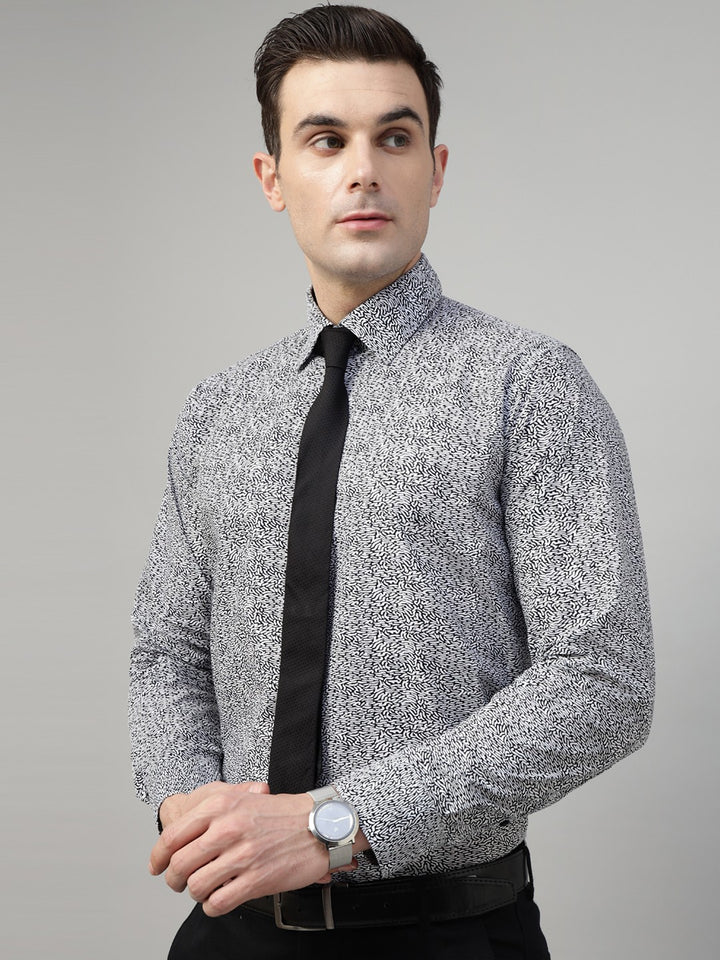 Pair this hancock white &amp; black abstract printed spread collar pure cotton wrinkle ressistant formal shirt with black trousers and waist belt with black formal shoes for party look.